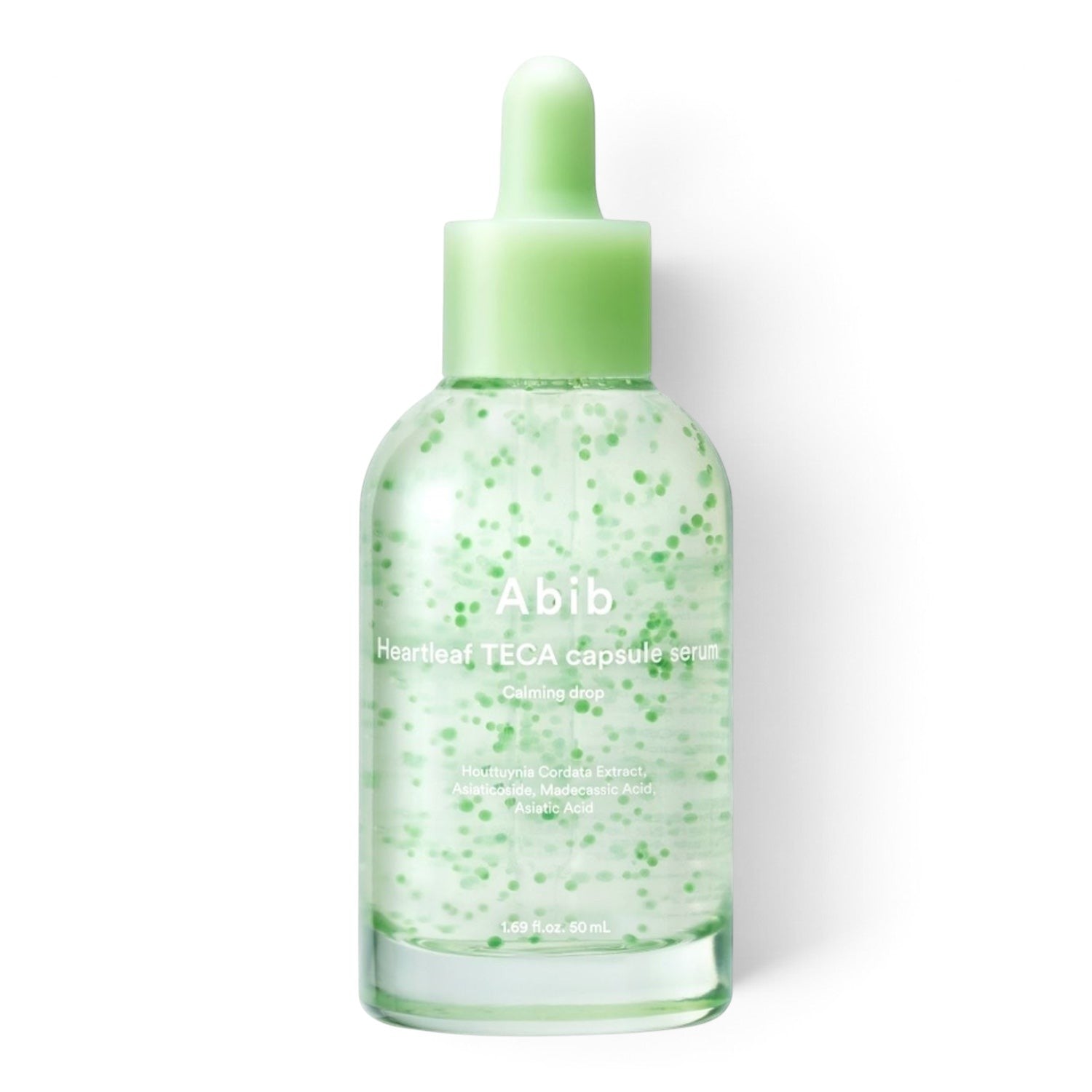 Abib Heartleaf TECA capsule serum from bareskin.lt in a clear glass bottle with green calming capsules