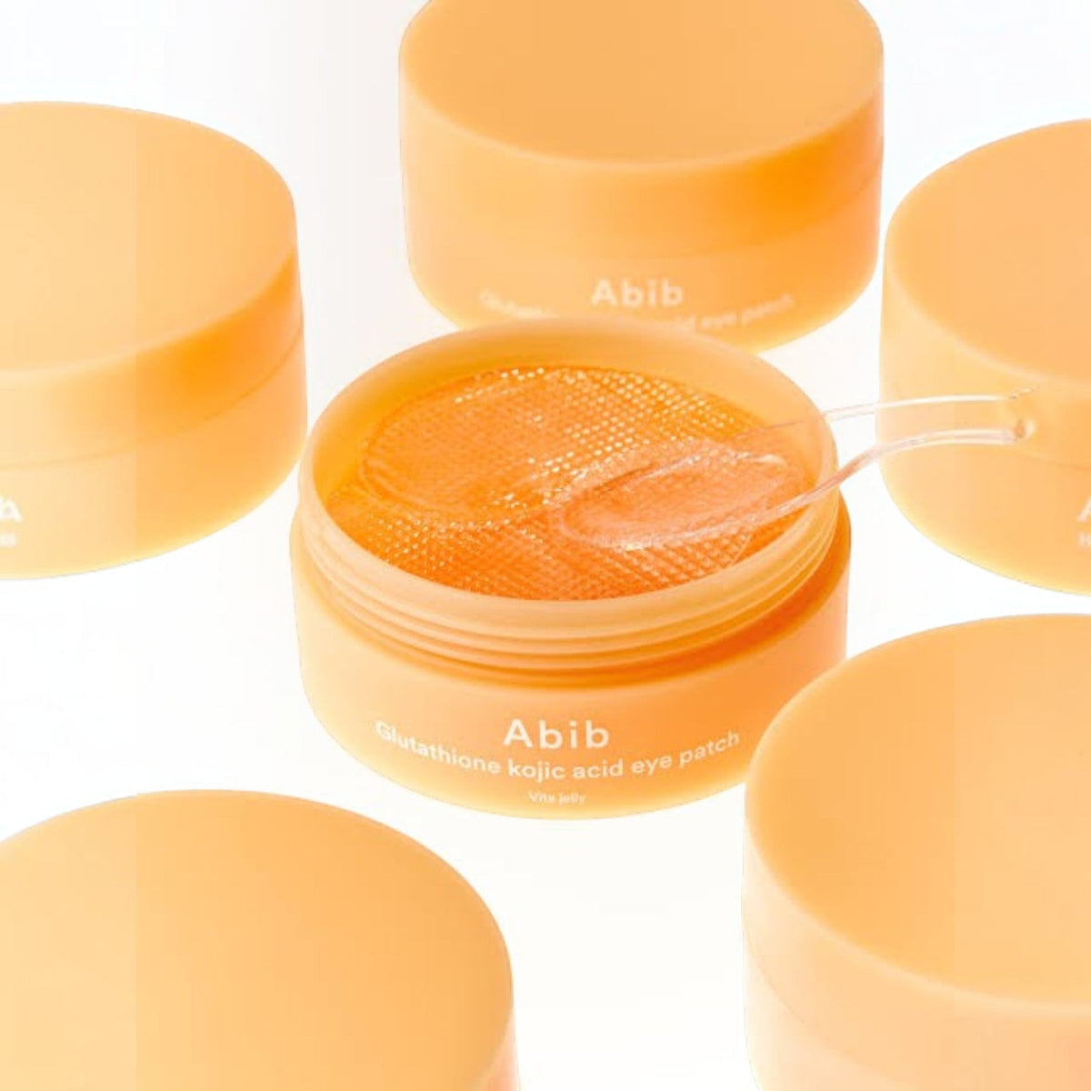 bareskin.lt Abib Vita Jelly Glutathione Kojic Acid hydrogel eye patches in an orange jar with a small spatula
