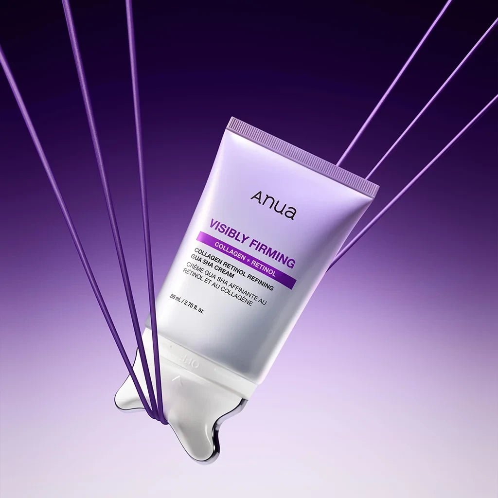 Anua Visibly Firming Collagen Retinol Gua Sha Cream in a white tube suspended against a purple background.