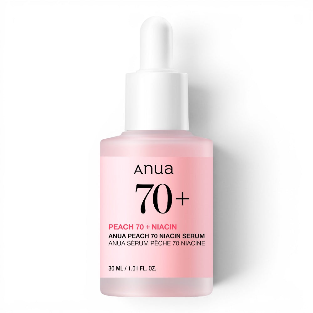 Anua Peach 70 Niacin Serum from bareskin.lt in a pink glass bottle with a white dropper for brightening skin tone.