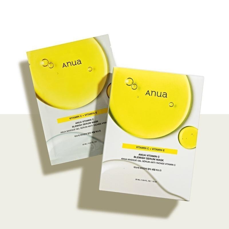 Two bareskin.lt Anua Vitamin C Blemish Serum sheet mask packets with bright yellow circular graphic design