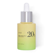 Anua Green Lemon Vita C Blemish Serum bottle from bareskin.lt featuring a yellow-to-green gradient glass dropper.