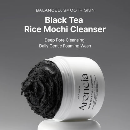 bareskin.lt Arencia Black Tea Rice Mochi Cleanser with a thick, dark, exfoliating texture in a white jar.