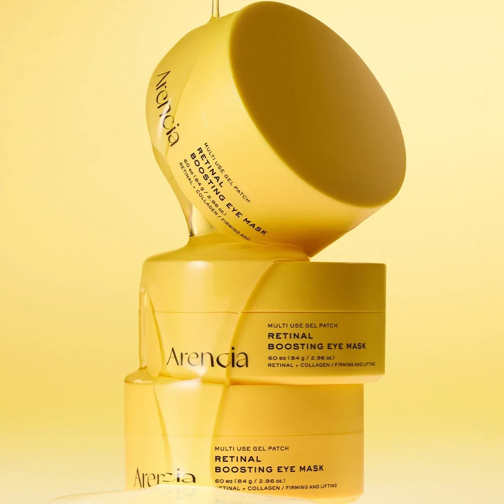 bareskin.lt Arencia Retinal Boosting Eye Mask jars stacked with yellow gel dripping on a bright yellow background