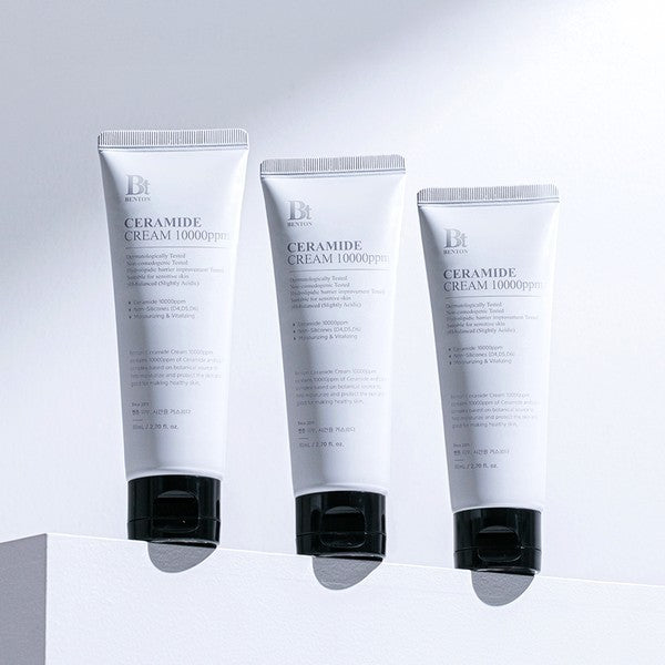 Three white tubes of Benton Ceramide Cream 10000ppm from bareskin.lt, featuring a minimalist design for dry skin.
