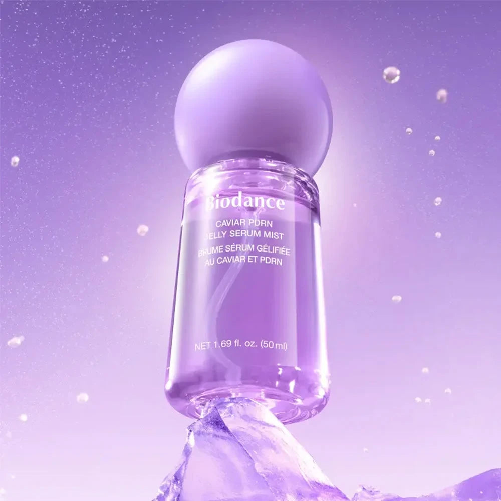 bareskin.lt Biodance Caviar PDRN Jelly Serum Mist in a purple bottle floating above ice against a purple background