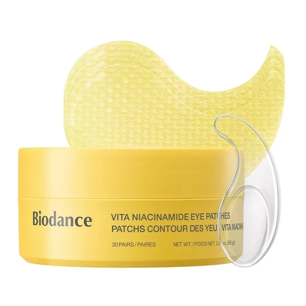 bareskin.lt Biodance Vita Niacinamide hydrogel eye patches in a yellow jar with a clear applicator spatula