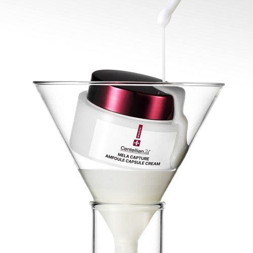 bareskin.lt Centellian24 Madeca Mela Capture Ampoule Capsule Cream in a glass funnel with dripping white serum