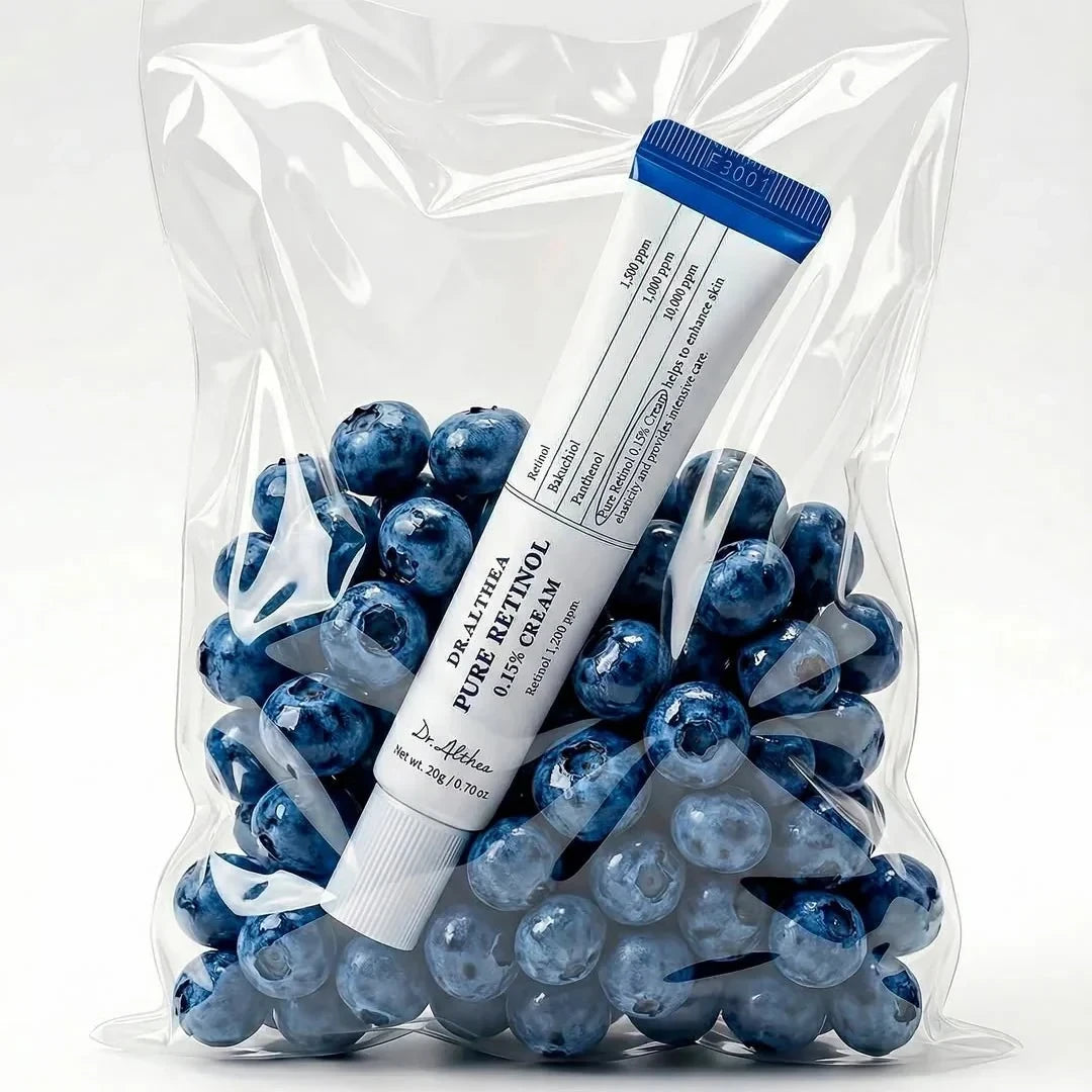 Dr. Althea Pure Retinol 0.15% Cream from bareskin.lt in a clear plastic bag filled with fresh blueberries