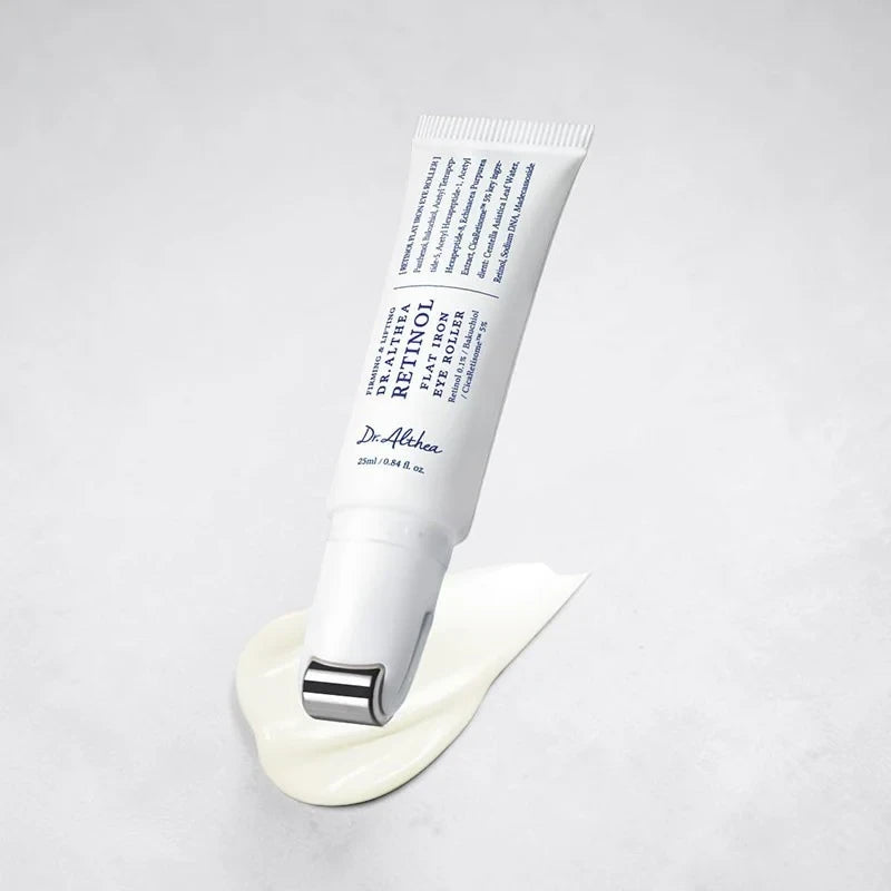 bareskin.lt Dr. Althea Retinol Flat Iron Eye Roller with metal applicator tip and dispensed cream on white background