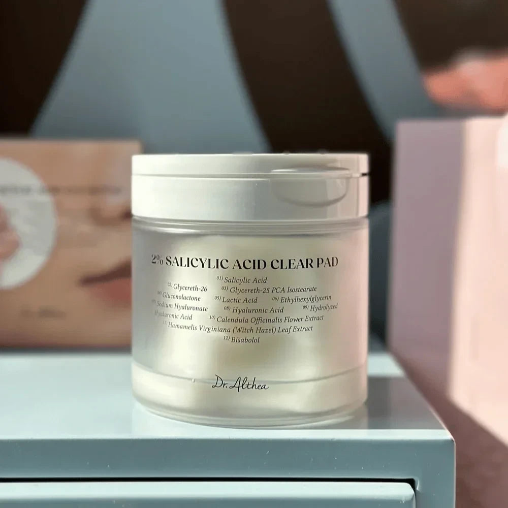 bareskin.lt Dr. Althea 2% Salicylic Acid Clear Pad jar with ingredient list on a light blue surface