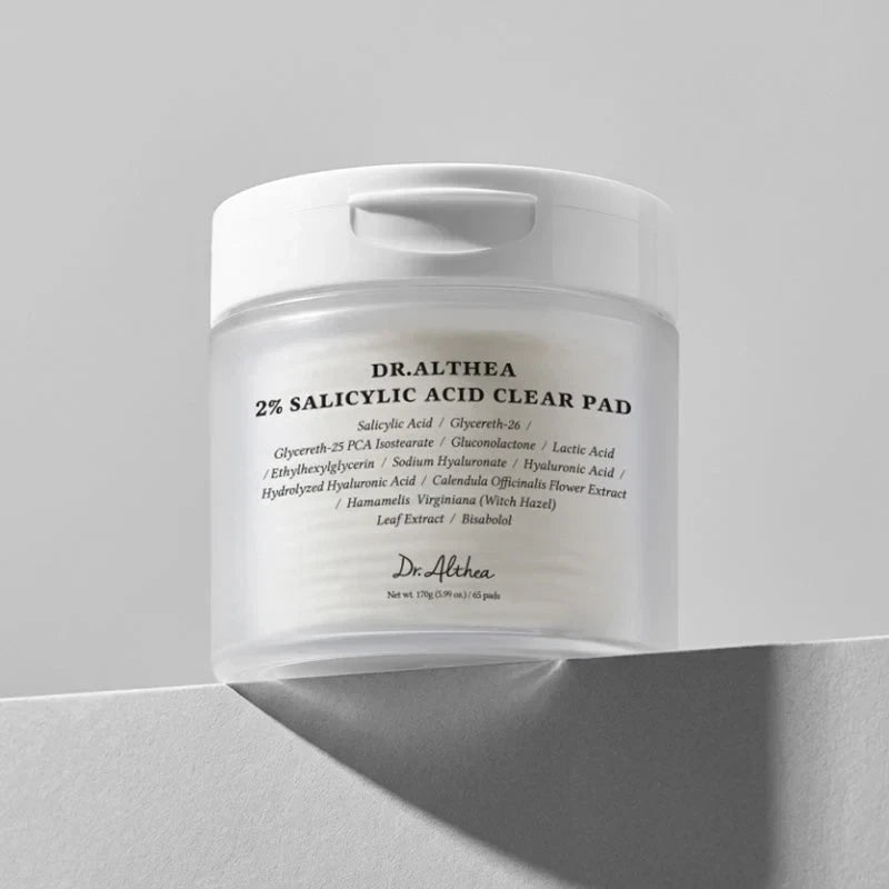 bareskin.lt Dr. Althea 2% Salicylic Acid Clear Pad toner jar with white lid on a minimalist grey background