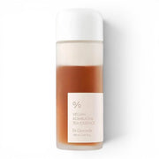 Dr. Ceuracle Vegan Kombucha Tea Essence in a frosted glass bottle from bareskin.lt for hydrated, glowing skin.