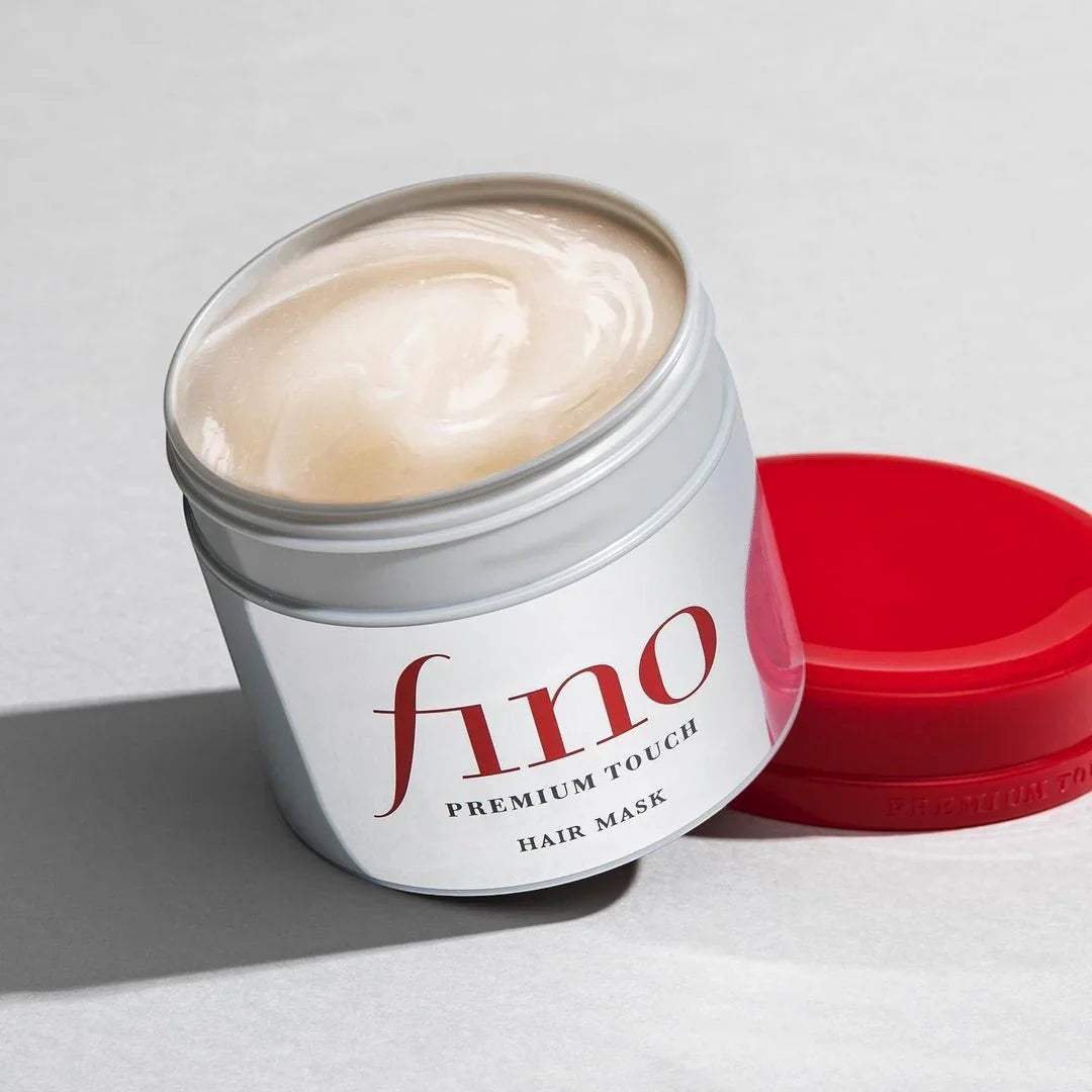 bareskin.lt Fino Premium Touch hair mask in a white jar with a red lid, featuring a rich, creamy texture.