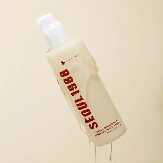 bareskin.lt KSECRET SEOUL 1988 Essence with snail mucin and rice extract in a clear pump bottle with dripping texture