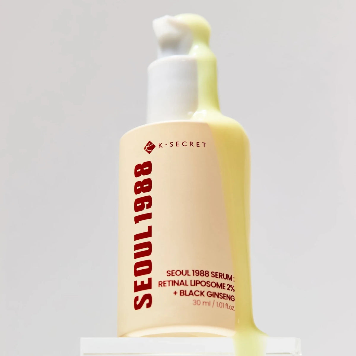 bareskin.lt KSECRET Seoul 1988 anti-aging serum with retinal liposomes and black ginseng dripping down the bottle