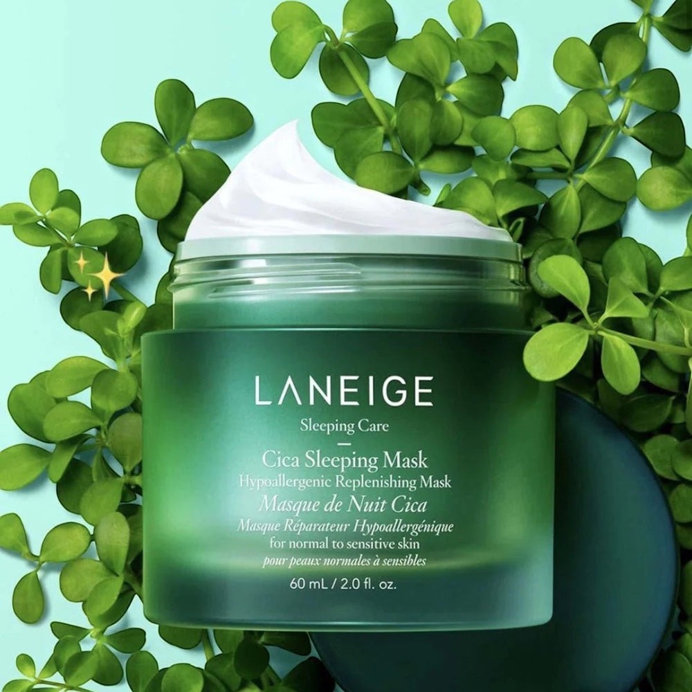 bareskin.lt Laneige Cica sleeping mask in a green jar surrounded by fresh green leaves for sensitive skin care