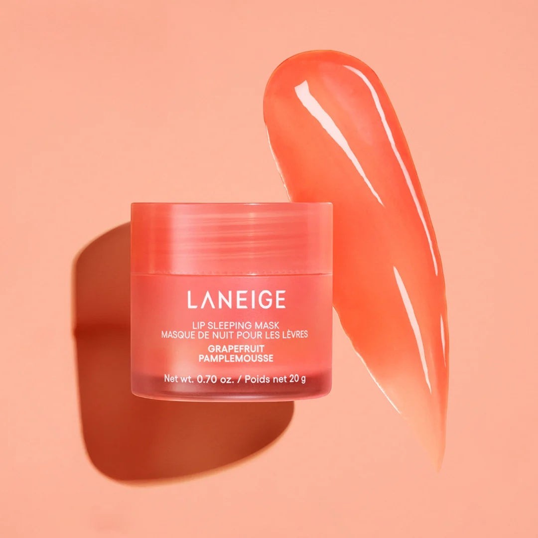 bareskin.lt LANEIGE Grapefruit Lip Sleeping Mask in a coral jar with a smooth swipe of the nourishing balm texture