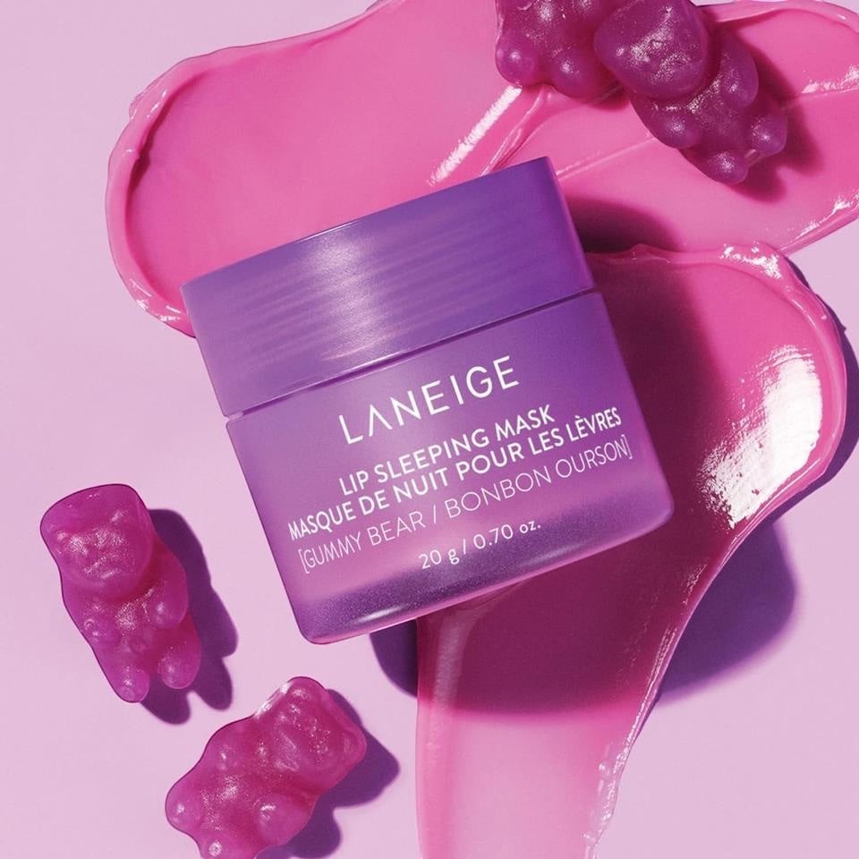 LANEIGE Lip Sleeping Mask Gummy Bear from bareskin.lt in a purple jar with pink cream swirls and gummy bear candies.