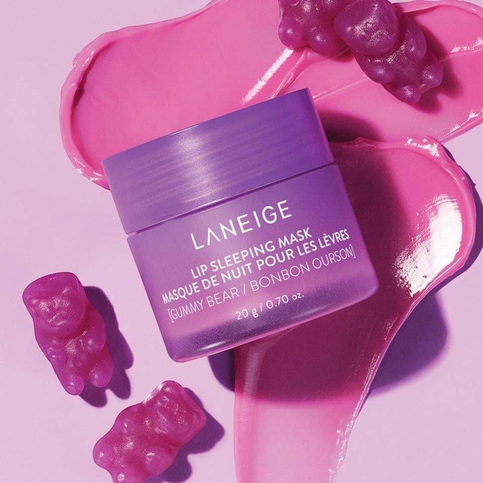 LANEIGE Lip Sleeping Mask Gummy Bear from bareskin.lt in a purple jar with pink cream swirls and gummy bear candies.
