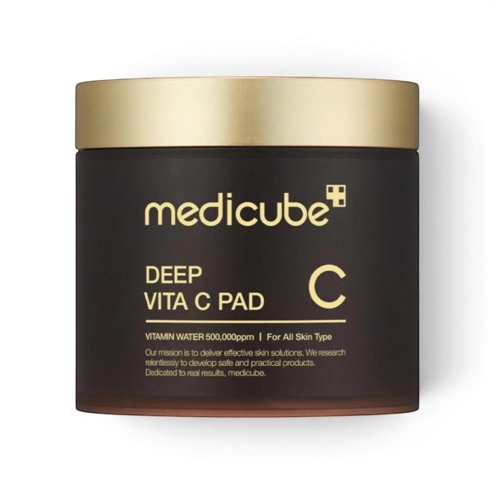 Medicube Deep Vita C Pad brightening toner pads in a dark brown jar with a gold lid from bareskin.lt