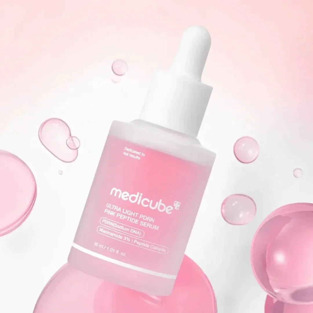 bareskin.lt Medicube Ultra Light PDRN Pink Peptide Serum in a glass dropper bottle with floating pink bubbles