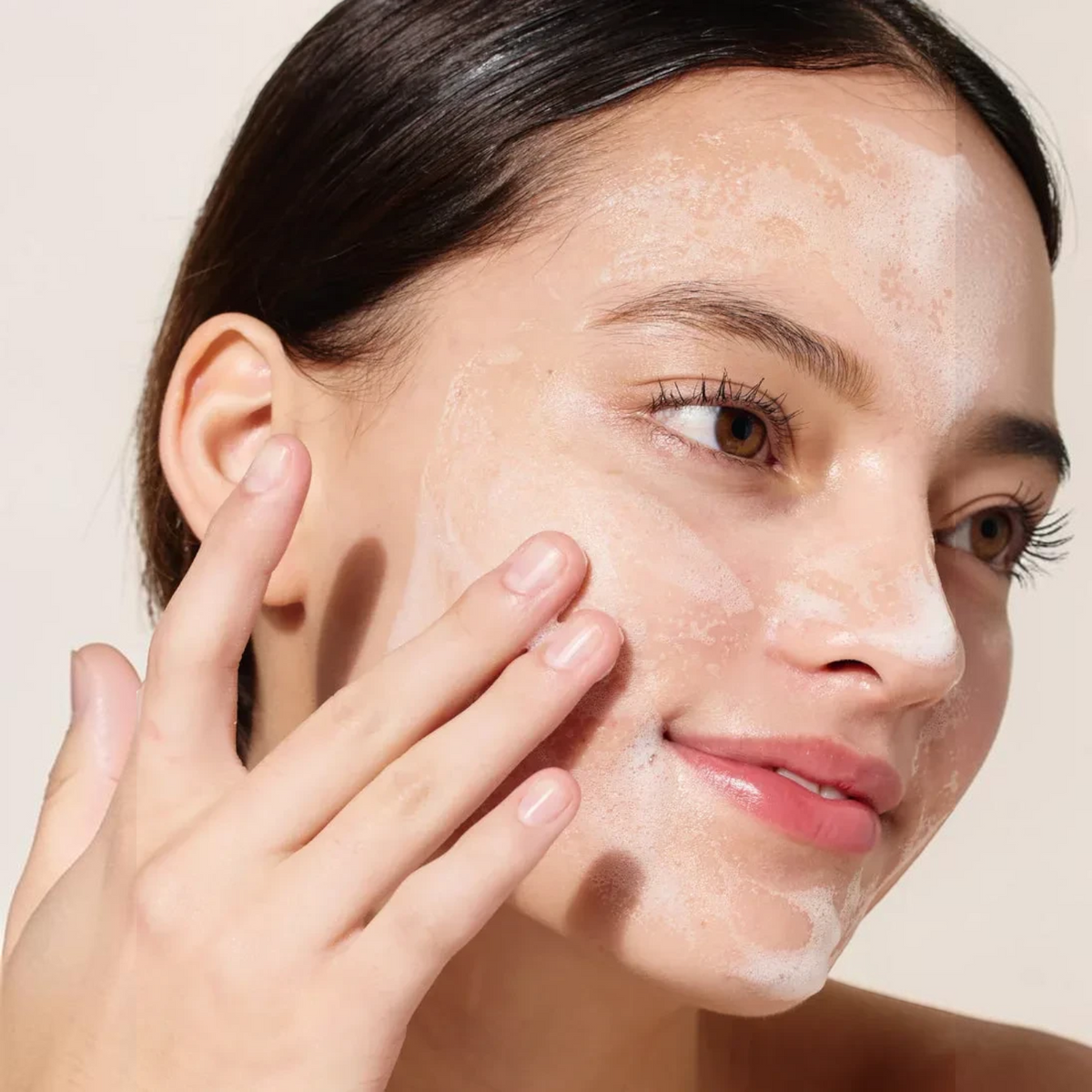 Woman applying bareskin.lt MENOKIN 30 Seconds Quick Bubble Mask Lift to her face for a refreshing skincare treatment