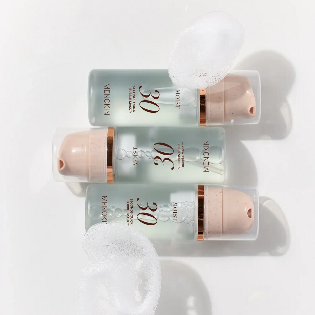 Three bottles of bareskin.lt MENOKIN 30 Seconds Quick Bubble Mask Moist with airy white foam on a white background.