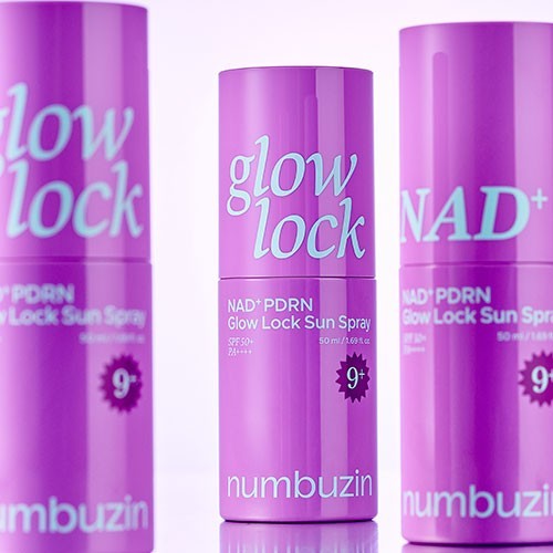 Three purple Numbuzin No.9 NAD+ PDRN Glow Lock Sun Spray bottles from bareskin.lt featuring a lightweight mist design.