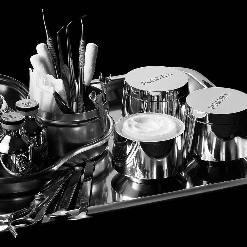 bareskin.lt PURCELL Pixcell Biom After Rebooting Cream in metallic jars on a professional medical tray with tools