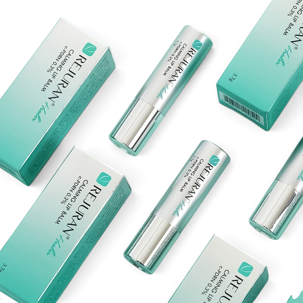 bareskin.lt REJURAN Calming Lip Balm tubes and boxes arranged on a soft teal background