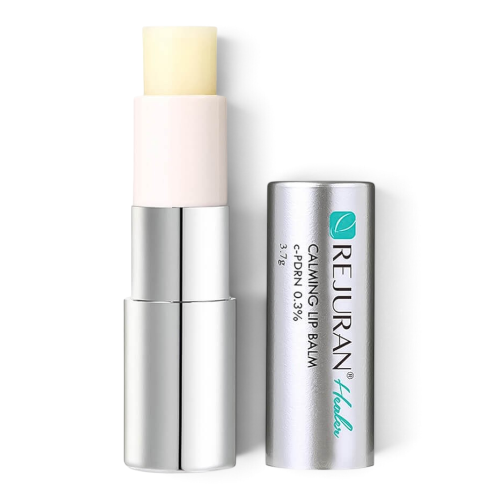 REJURAN Calming Lip Balm by bareskin.lt in a silver twist-up tube with a pale yellow balm stick