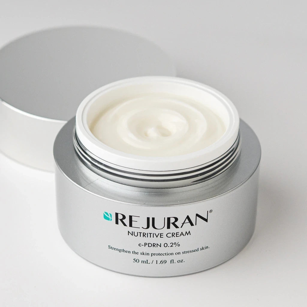 bareskin.lt Rejuran Nutritive Cream in a silver jar with a white creamy texture visible inside