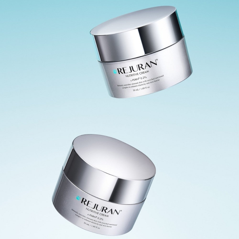 Two jars of bareskin.lt Rejuran Nutritive Cream with silver lids against a light blue gradient background.