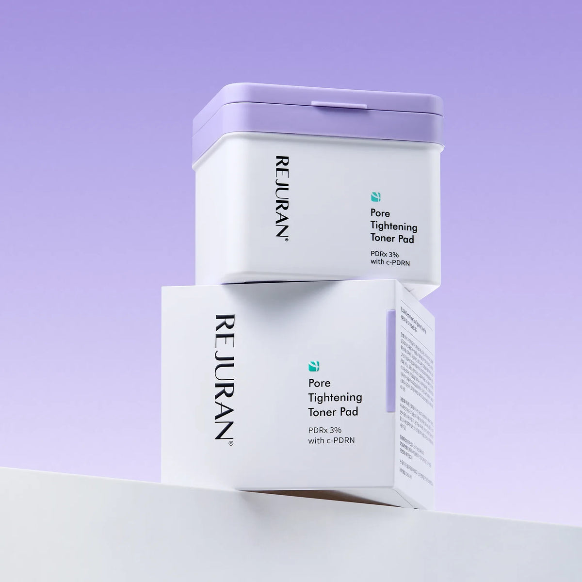 REJURAN Pore Tightening Toner Pad containers from bareskin.lt featuring PDRx 3% formula for skin texture refinement.