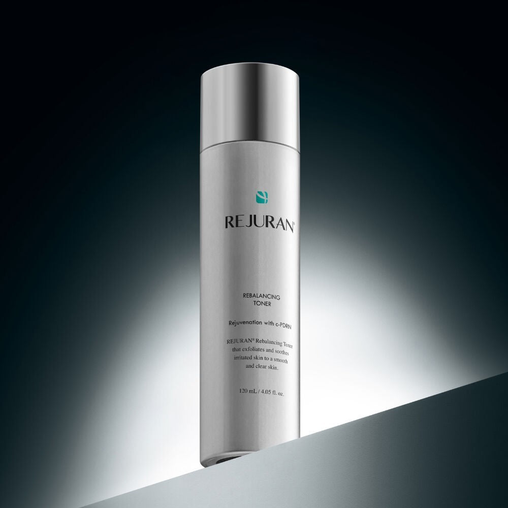 REJURAN Rebalancing Toner by bareskin.lt in a silver bottle for soothing and hydrating facial skin care.
