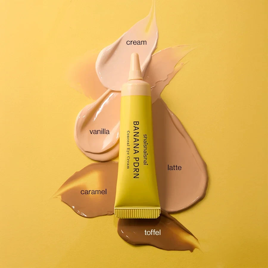bareskin.lt shaishaishai Banana PDRN Conceal Eye Cream tube surrounded by various skin tone cream swatches
