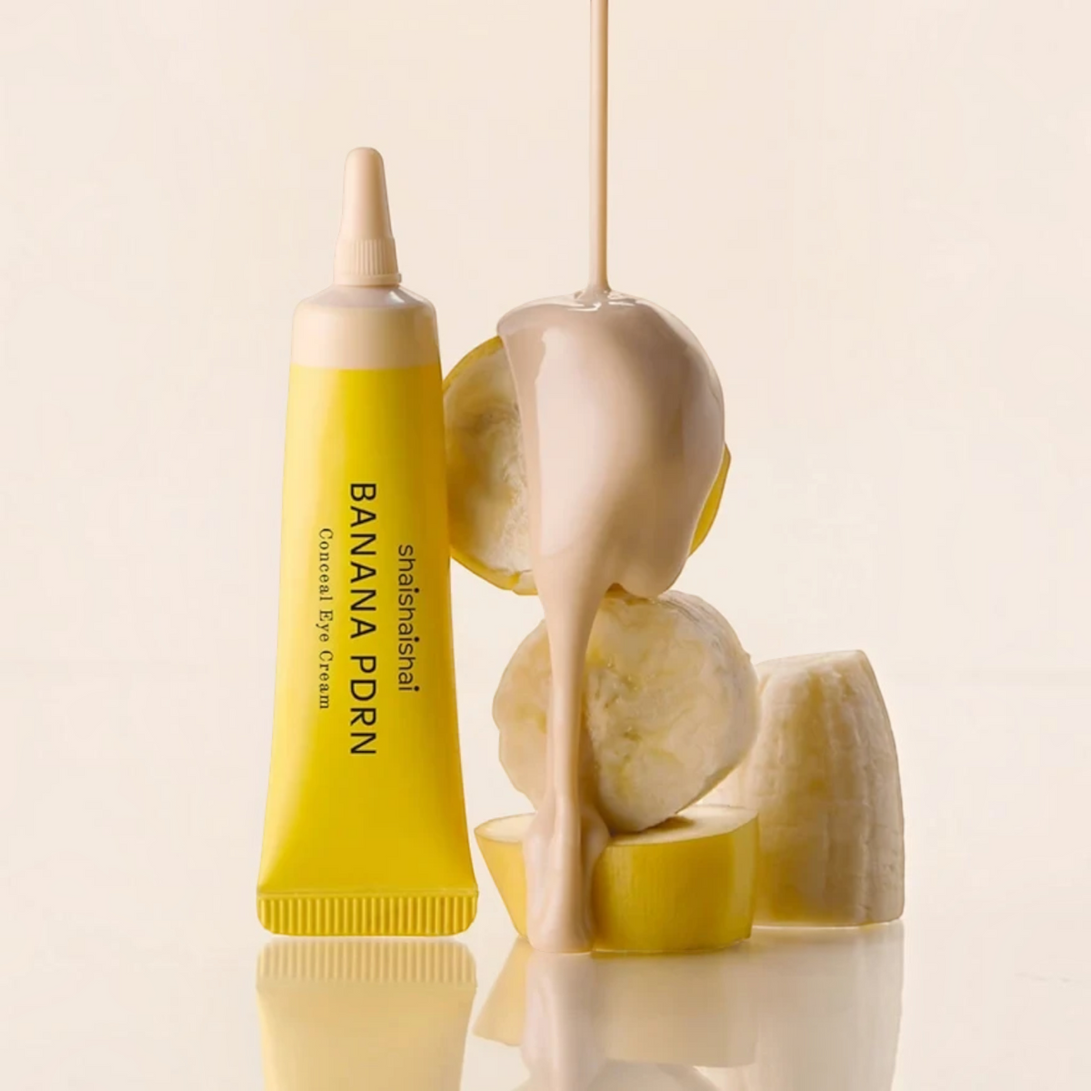 bareskin.lt shaishaishai Banana PDRN Conceal Eye Cream in a bright yellow tube with a creamy texture and banana slices