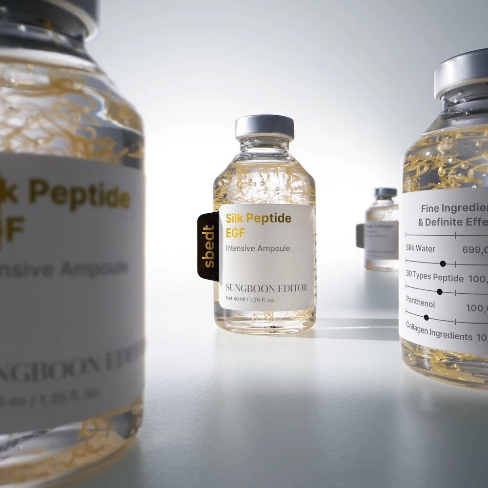 bareskin.lt SUNGBOON EDITOR Silk Peptide EGF Intensive Ampoule in a clear glass bottle with gold silk threads inside.