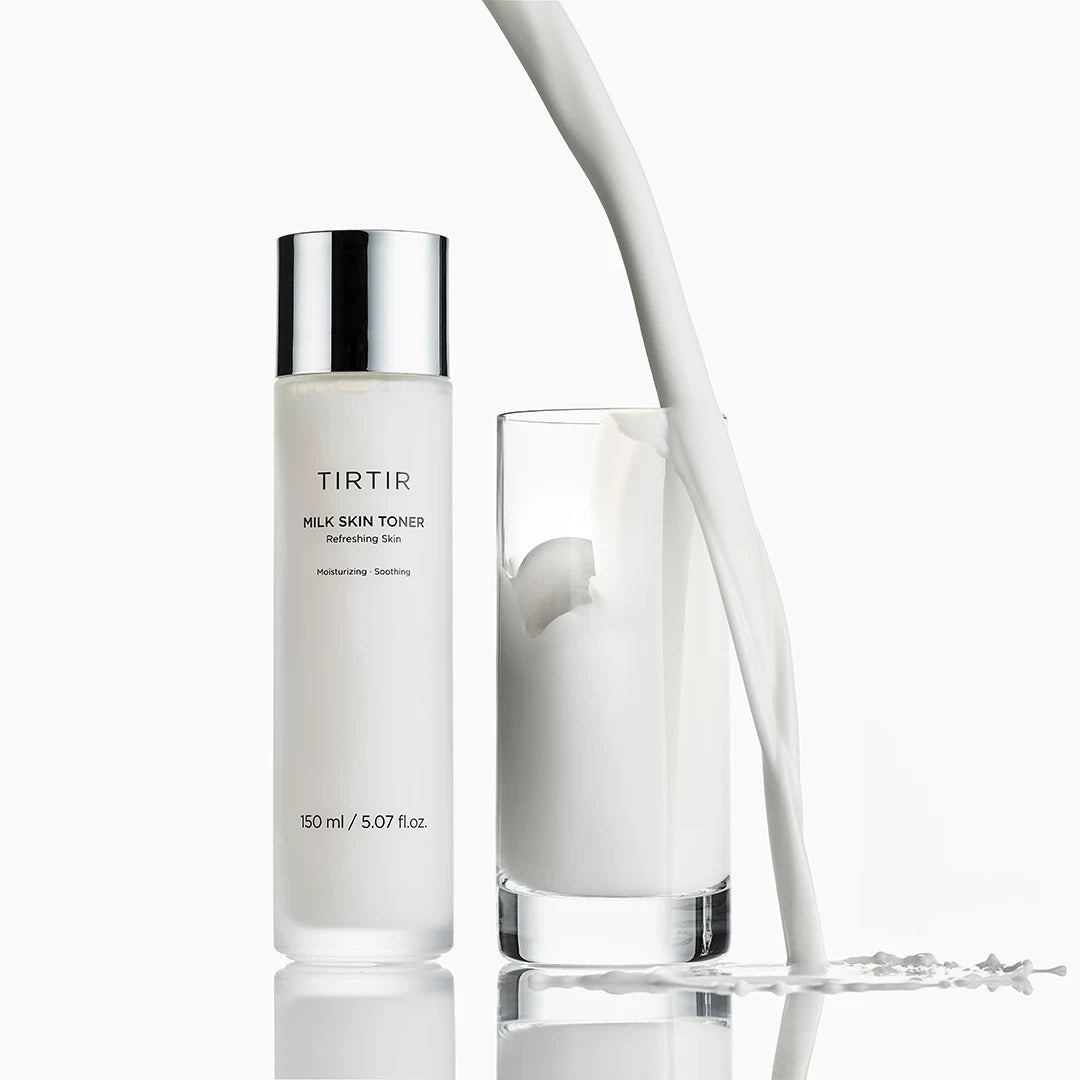 bareskin.lt TIRTIR Milk Skin Toner bottle next to a glass with pouring milk, highlighting its hydrating formula.