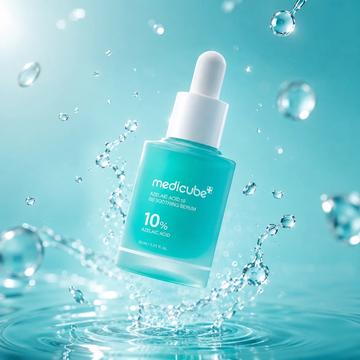 Medicube Azelaic Acid 10 BB Soothing serum from bareskin.lt in a teal bottle surrounded by refreshing water splashes.
